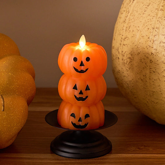 Russet Orange Flameloss Candle  Stacked Jack-o-lanterns
